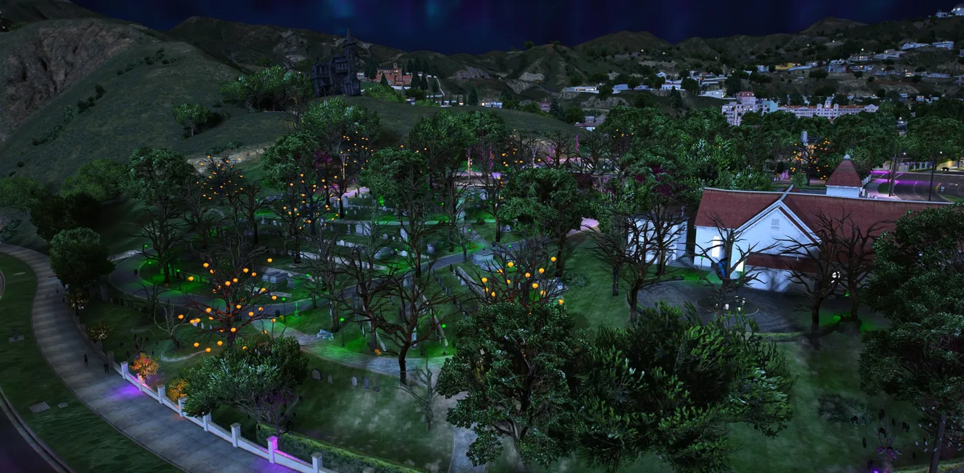 The hillside cemetery at night lit in eerie green and orange, with a dark gothic house on the ridge above